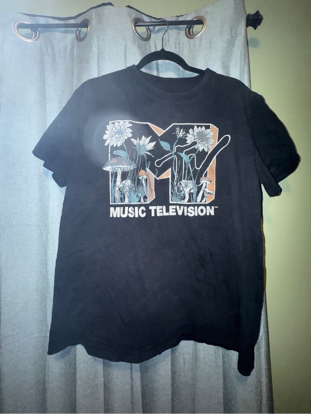 MTV Black Tee with Floral Logo Accents